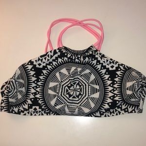 Bathing suit top with pink crossed straps